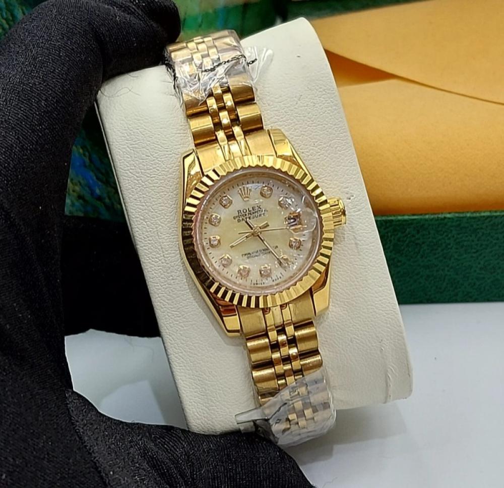 ساعة رولكس نسائية شفافة بالكامل بمينا شامباني صغيرة (رولكس).