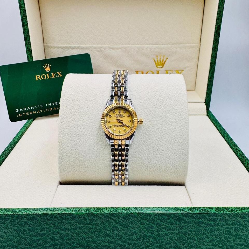 ساعة رولكس نسائية ذات إطار دائري اللون بمينا شامباني صغيرة (رولكس).