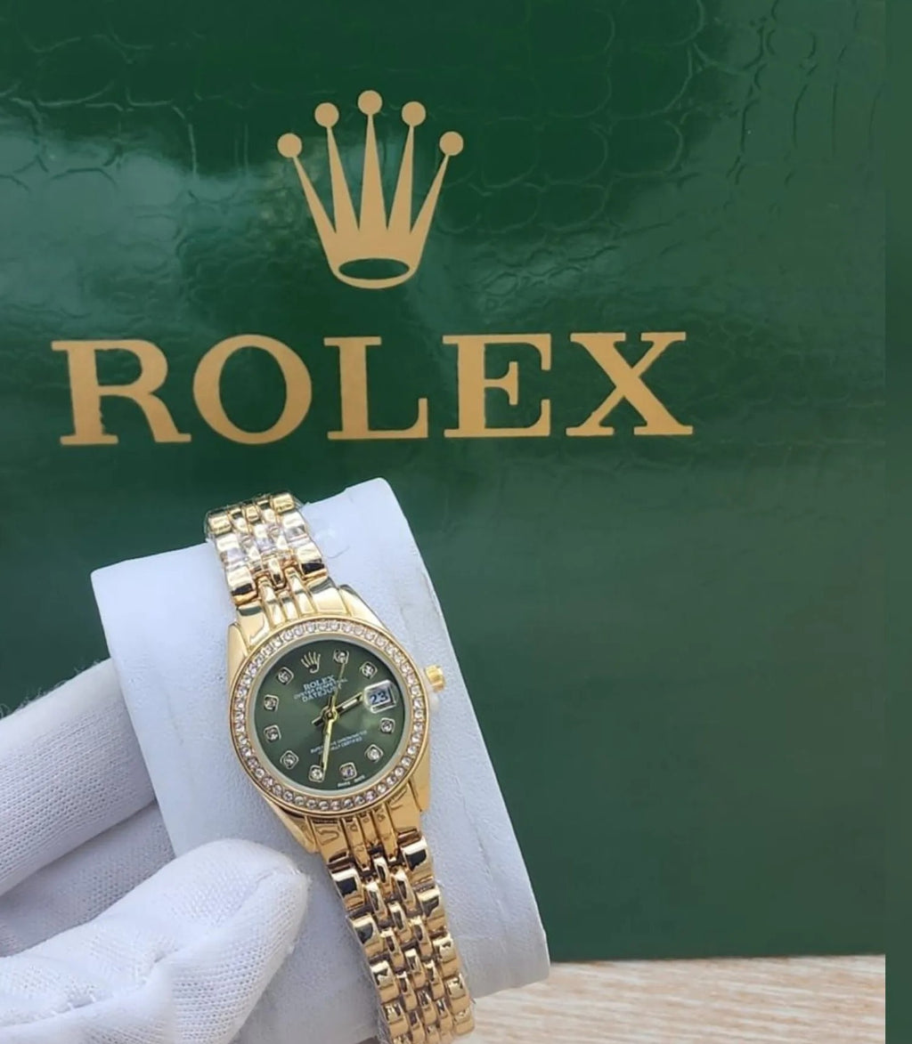 ساعة رولكس نسائية شفافة بالكامل بمينا خضراء زمردي صغير (رولكس).